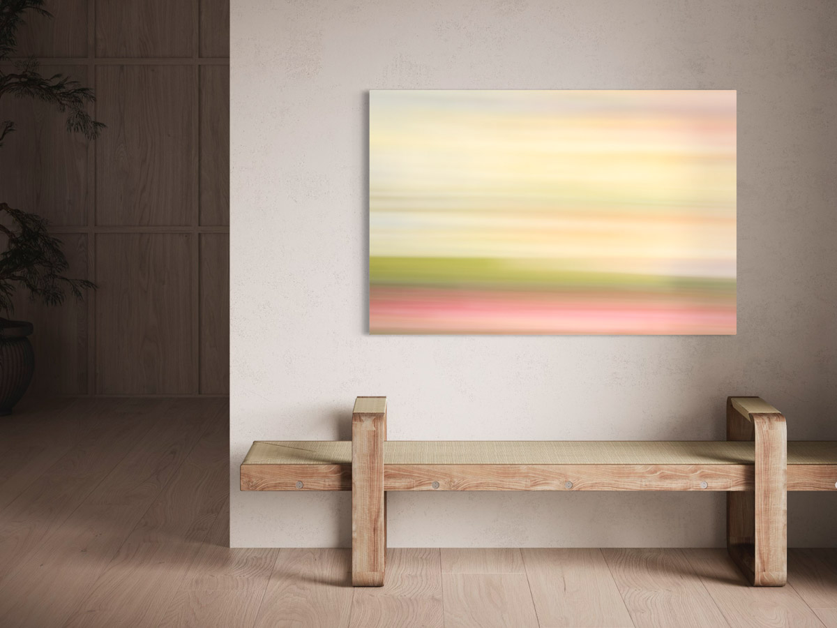 A painting of a green and pink field in front of a wall.