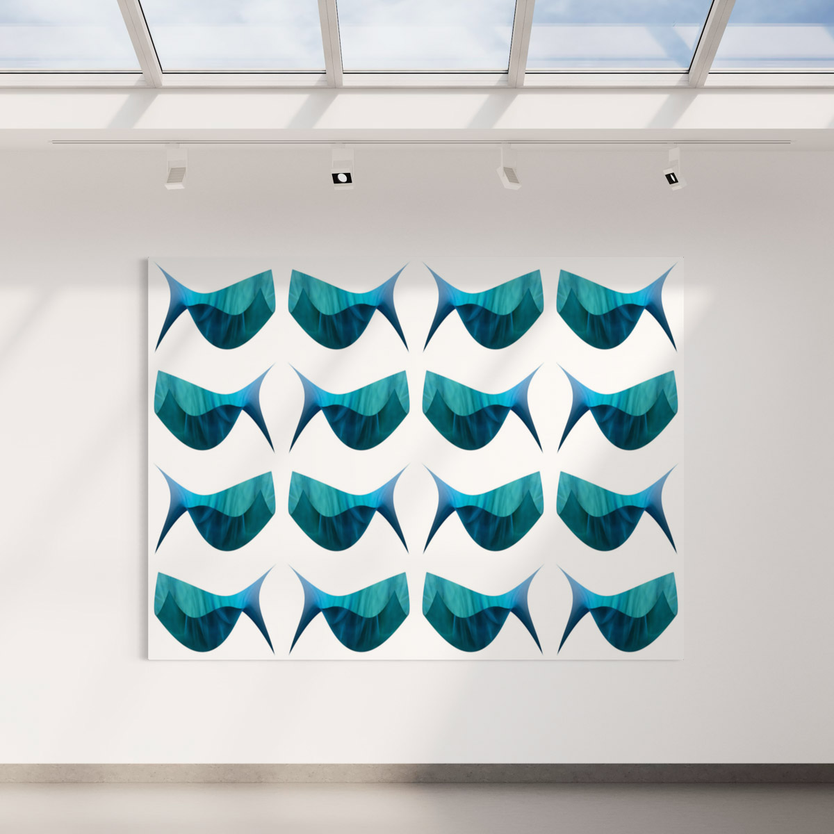A white wall with many blue and green shapes on it