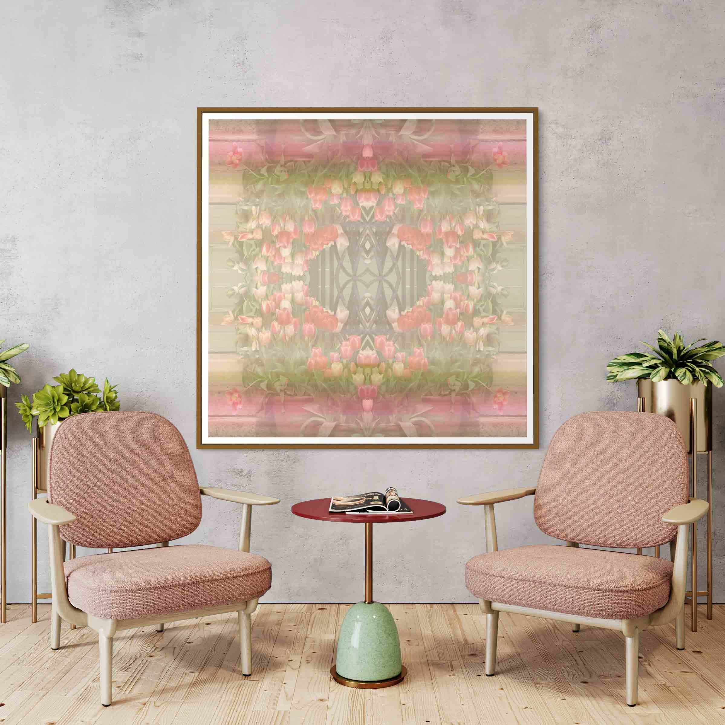 A couple of pink chairs in front of a painting.